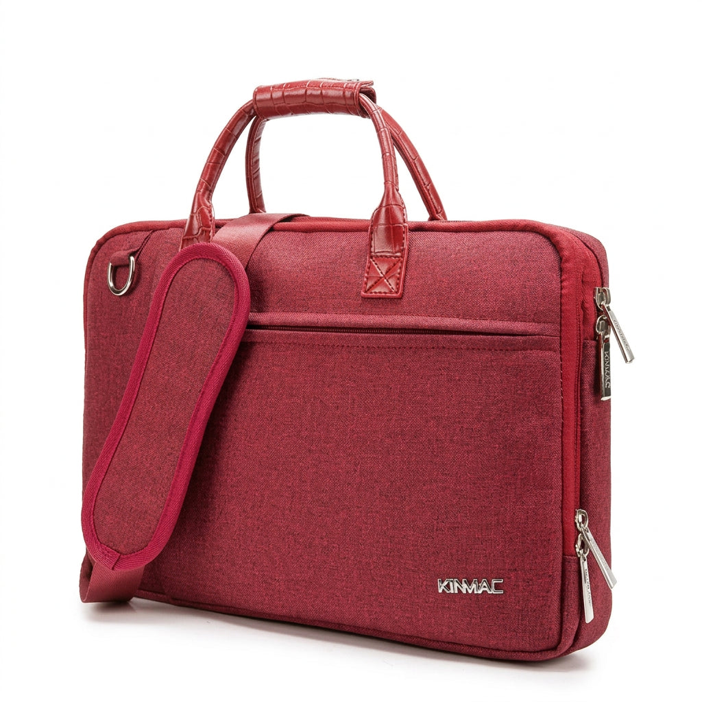 Red Kinmac laptop bag with padded construction, front pocket and shoulder strap.
