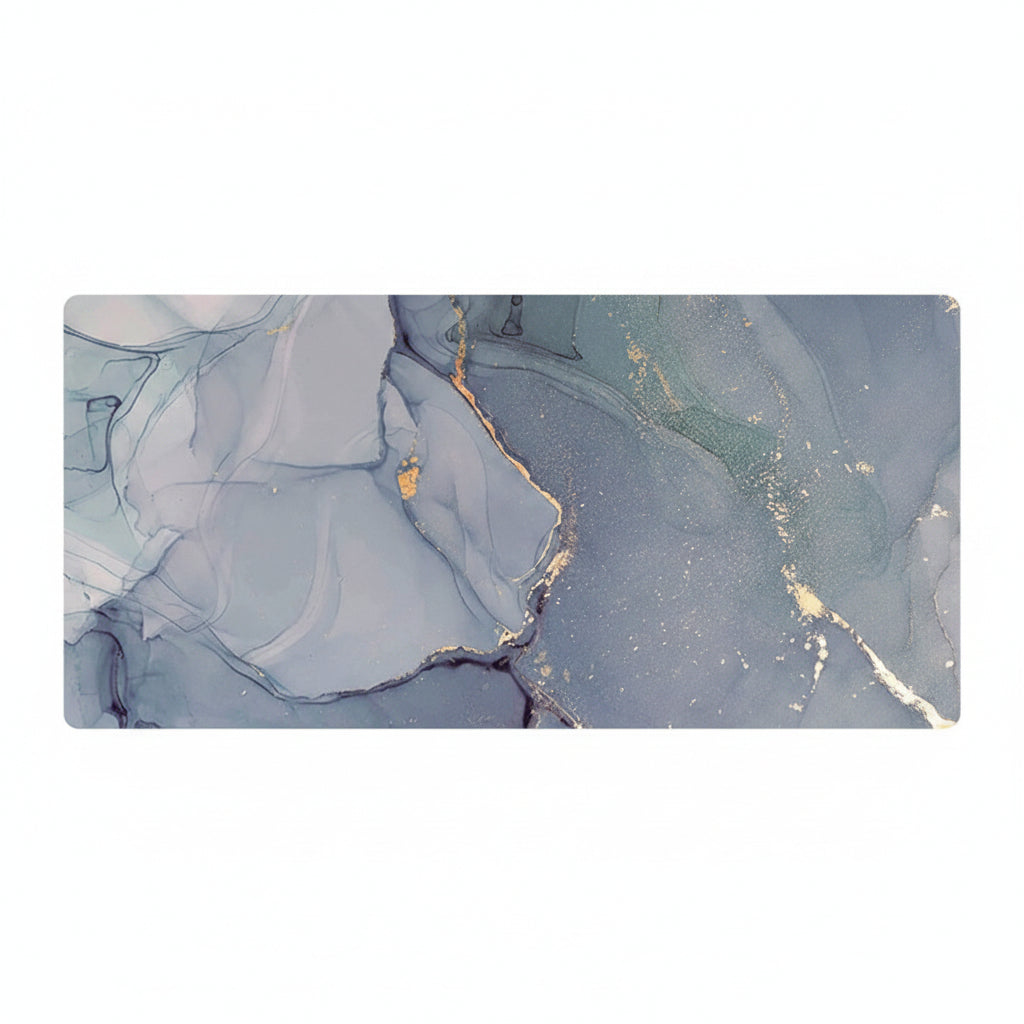 A rectangular desk mat featuring a fluid marble design in shades of slate blue, gray, and white, accented with delicate gold veins, shown against a plain white background.
