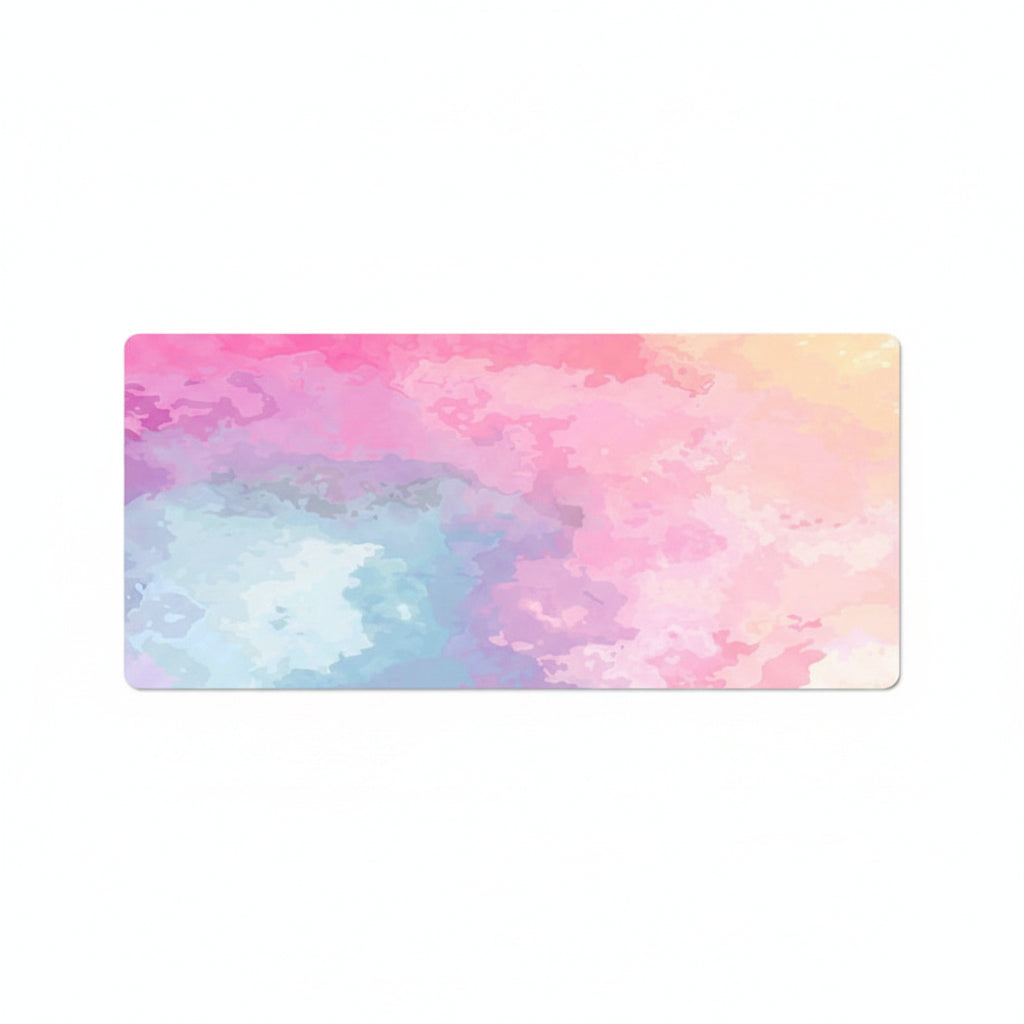 A large desk mat with a pastel watercolor design in pink, blue, and purple, shown on a plain white background