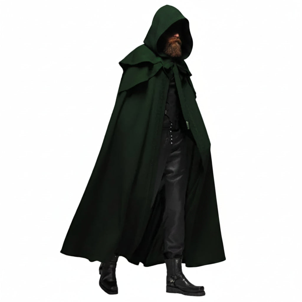 A person wearing a long dark green hooded cloak over a black outfit and black boots, shown against a plain white background.