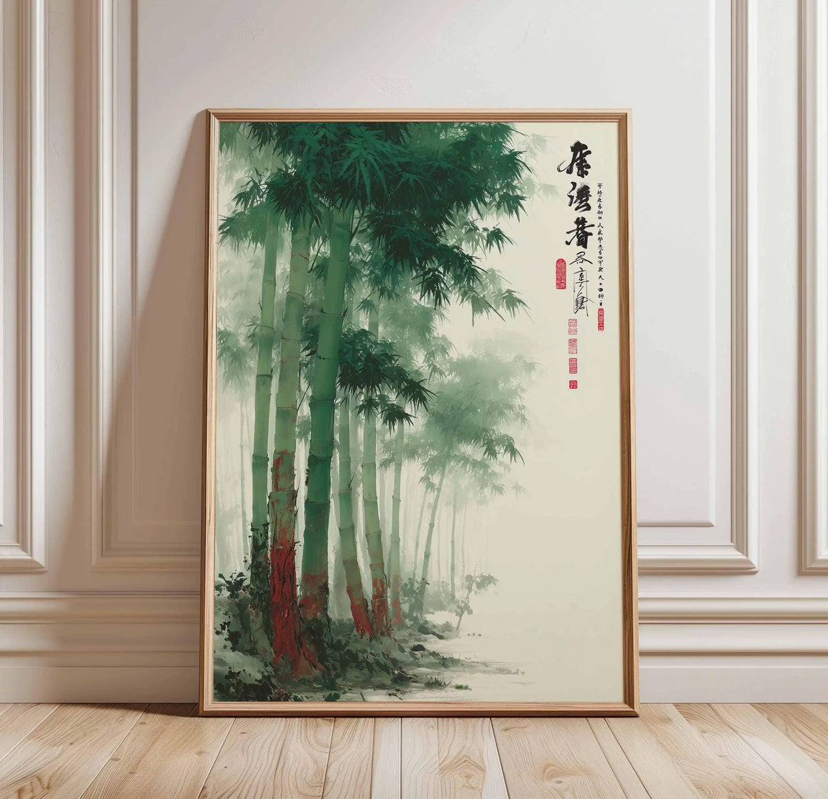 Framed artwork of a bamboo forest with calligraphy on a wall.