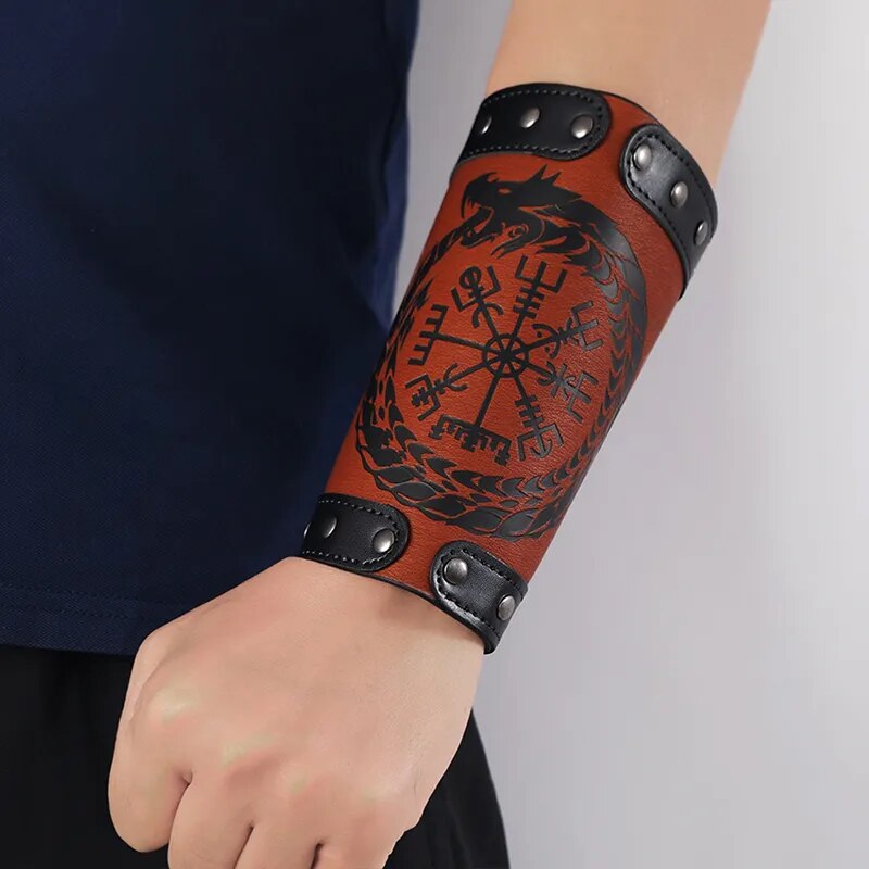 Brown Viking faux leather forearm arm guard with Norse compass design worn on the arm