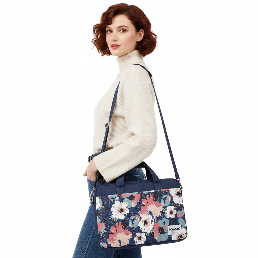 Woman carrying a floral-patterned bag on a white background