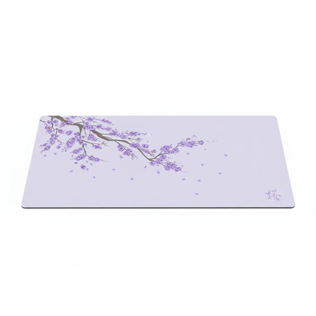 large desk mat with purple cherry blossoms on a white background