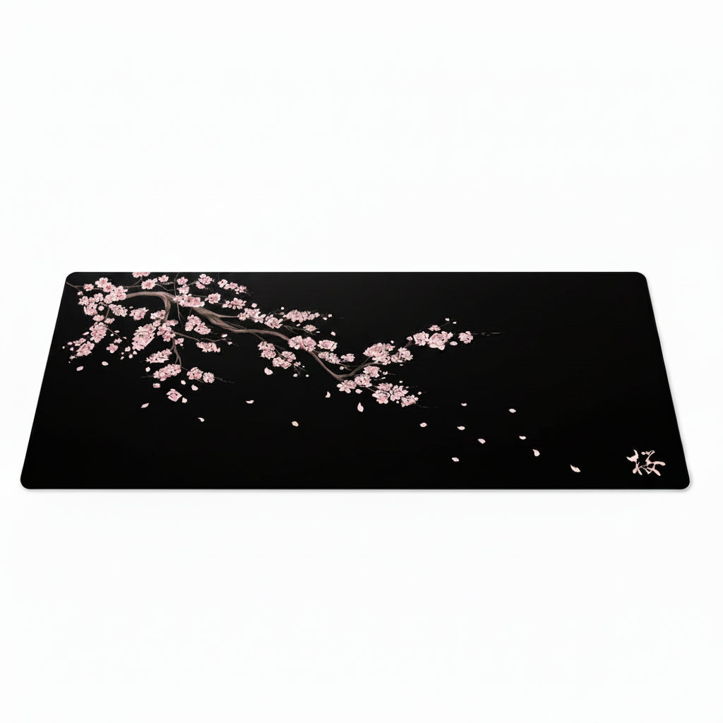 Sakura cherry blossom gaming desk mat with pink flowers on a dark background