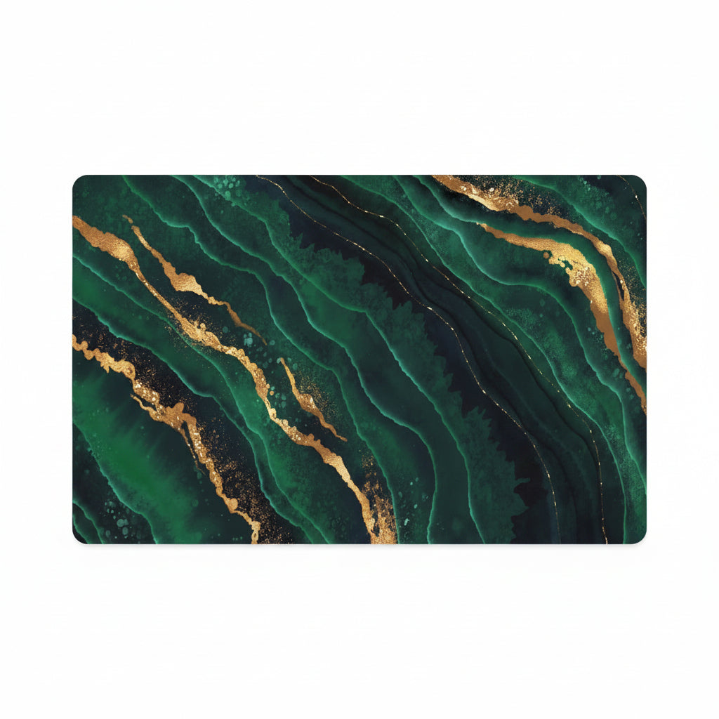A rectangular mat with rounded corners featuring an abstract green and black marble pattern with metallic gold veining, shown on a plain white background.