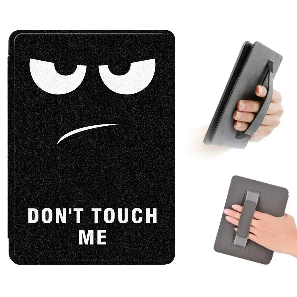 Black Kindle device case with a face and 'Don't Touch Me' text, held by a hand.
