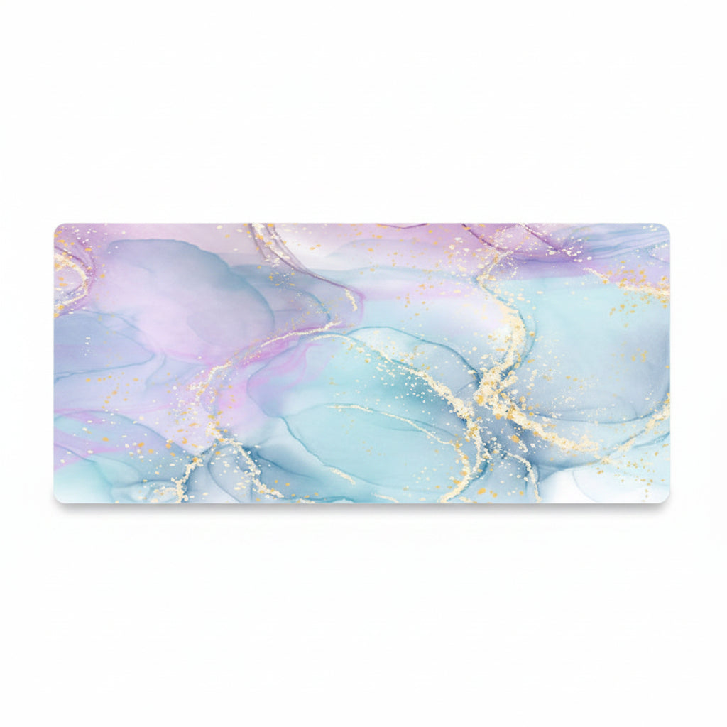 A rectangular desk mat with a pastel liquid marble design featuring shades of light blue, lavender, and pink with metallic gold veins, shown on a plain white background.