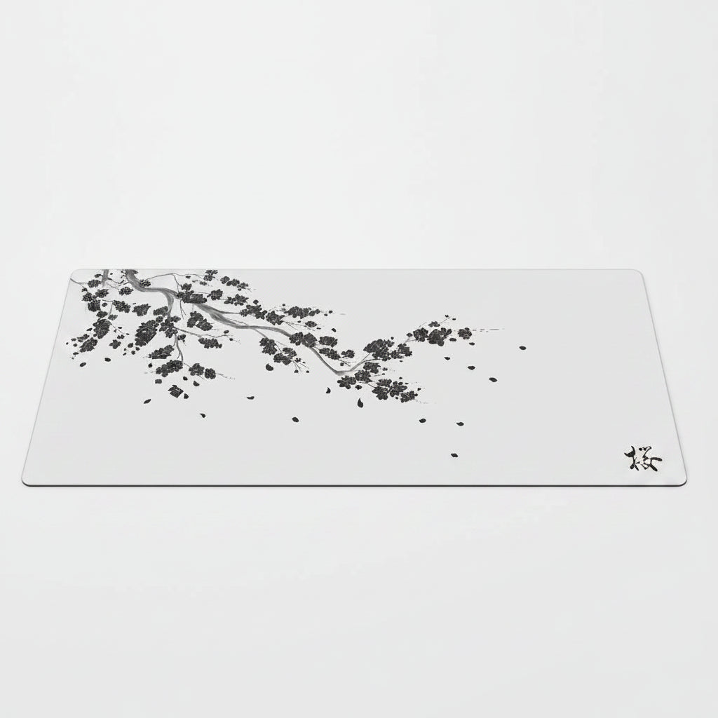 Cherry blossom gaming desk mat showing the floral surface and finished edge