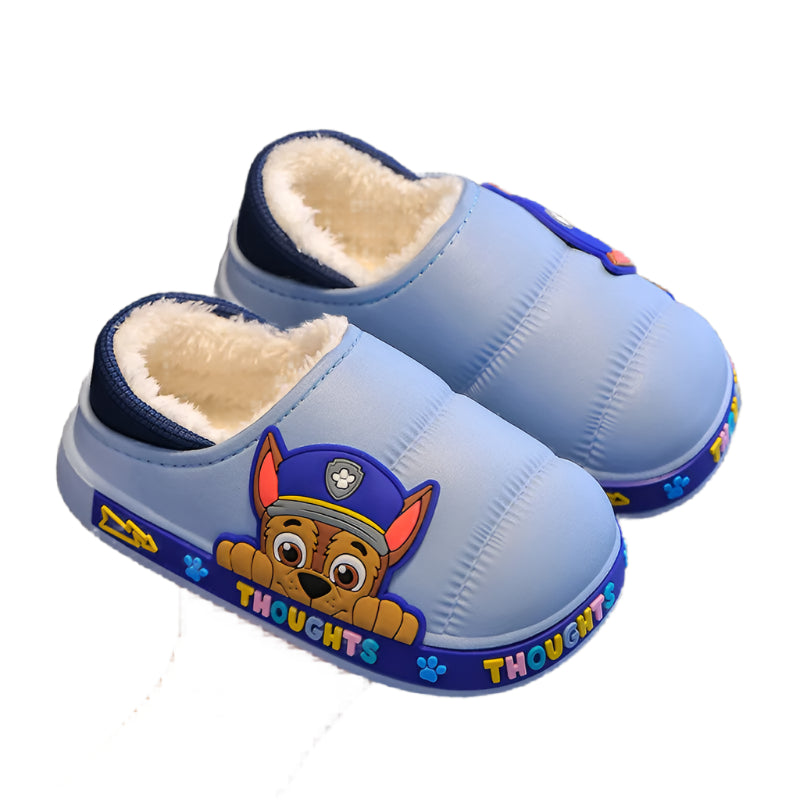 A pair of blue kids' slippers featuring a Paw Patrol character on the upper.