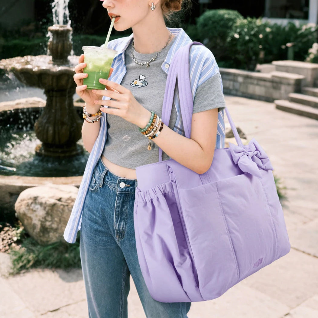 BAGSMART lavender bow-detail tote bag carried over the shoulder