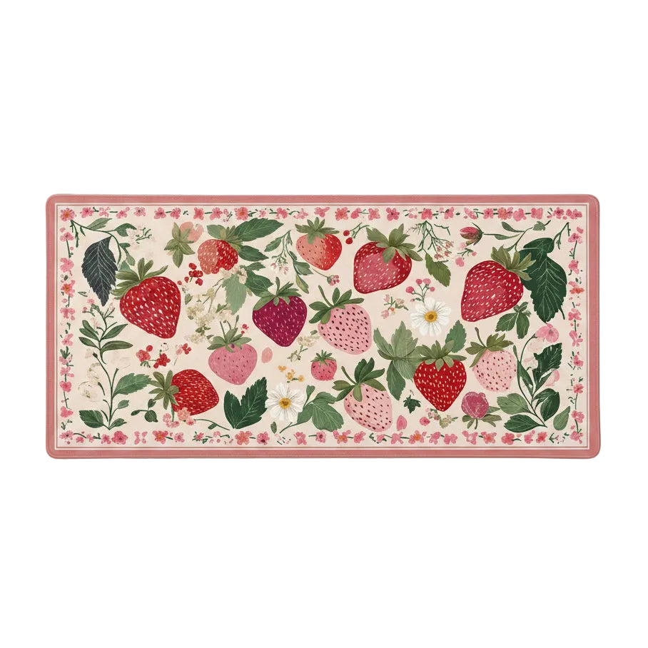 Strawberry floral desk mat showing pink border and botanical design