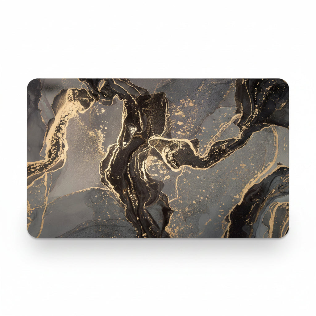 A rectangular desk mat featuring an abstract fluid art design with swirling black, gray, and metallic gold patterns, displayed against a clean white background.