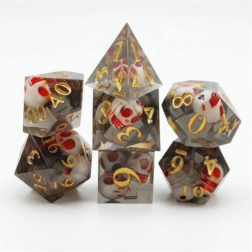 Seven translucent black resin polyhedral dice with embedded skull details and numbered faces