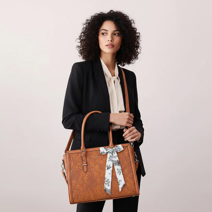 Woman carrying MOSISO floral laptop tote bag in brown