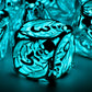 Skulls Glow in the Dark Metal Dice Set