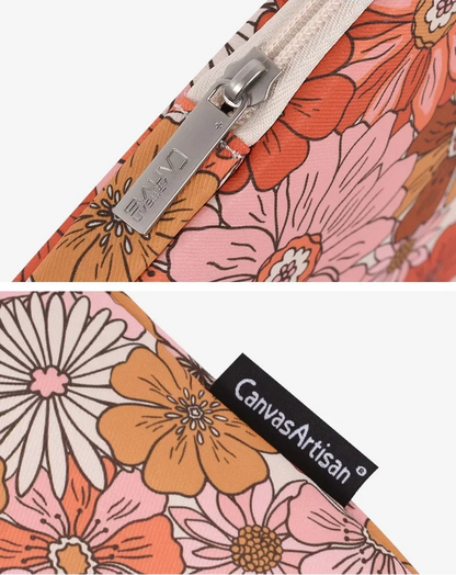 Close-up of floral 70s vibe laptop sleeve fabric and zipper
