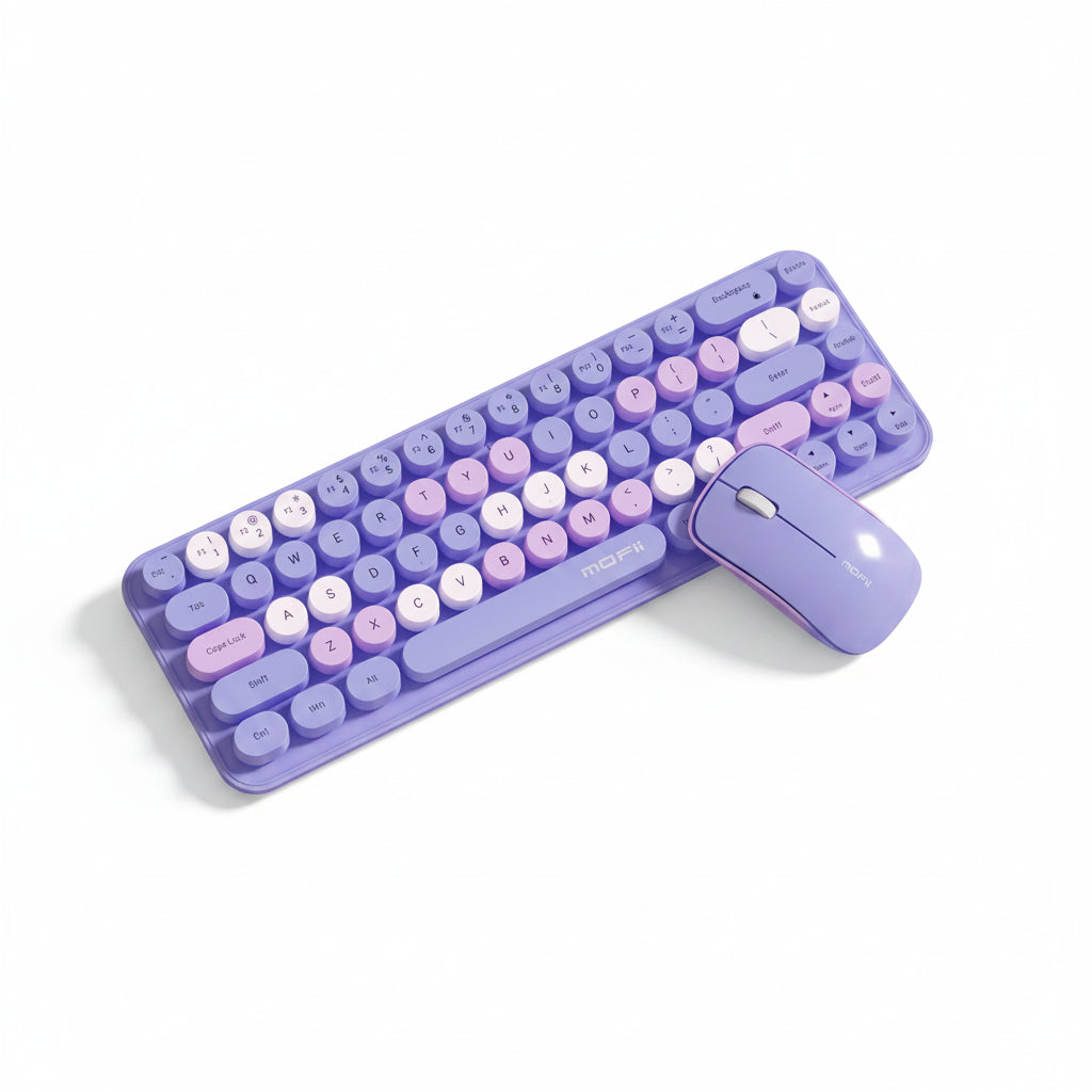 A wireless keyboard and matching mouse in pastel purple, lavender, and pink tones, arranged on white background