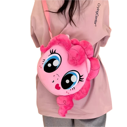 A plush handbag featuring a character from My Little Pony, with a soft pink color and a cute facial expression.