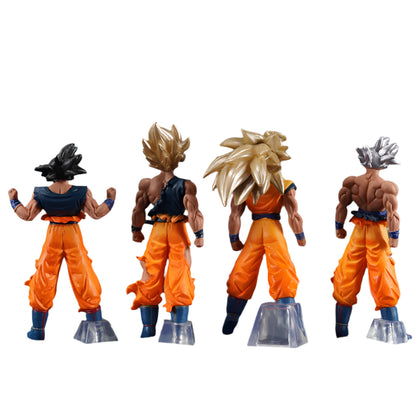 Four action figures in different poses on a white background
