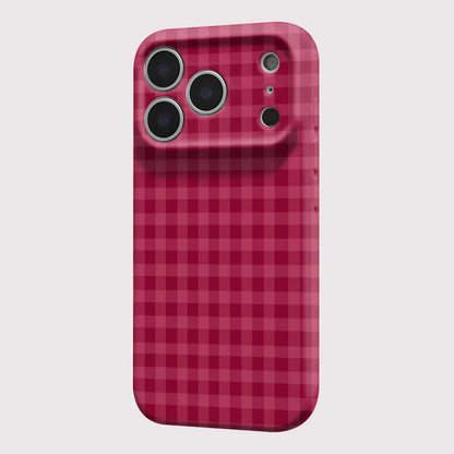 A phone case with a dark pink and red gingham plaid pattern, shown from the back on a white background.