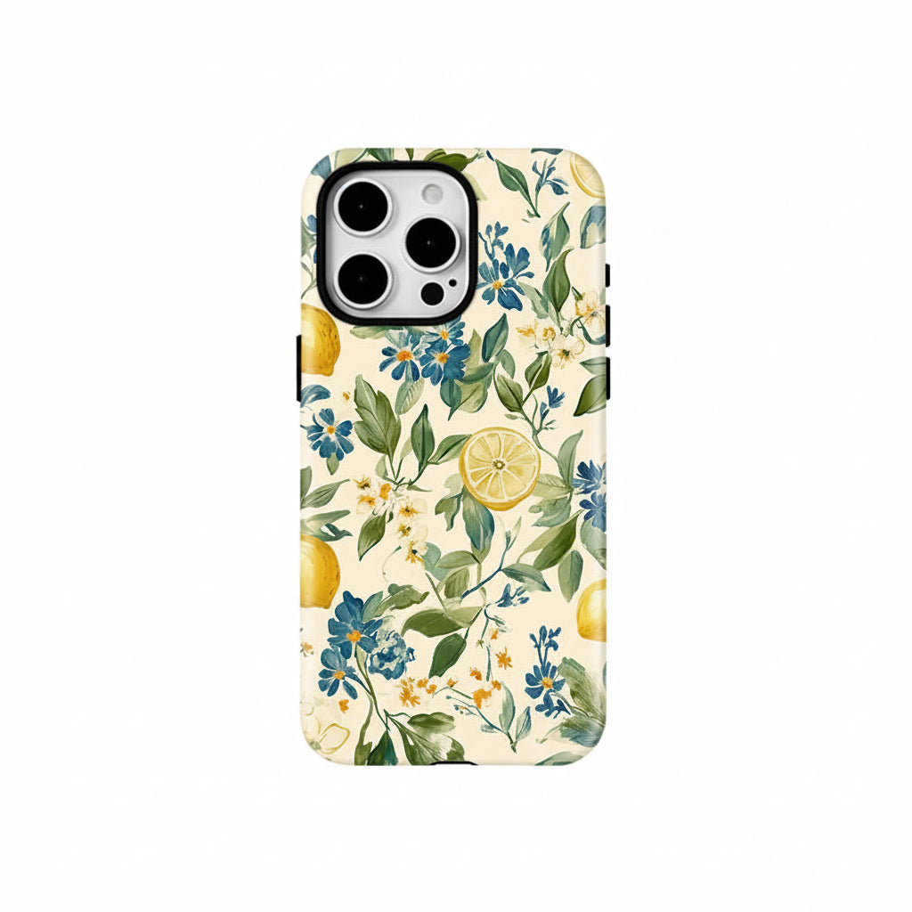 Phone case with floral and lemon design on a white background