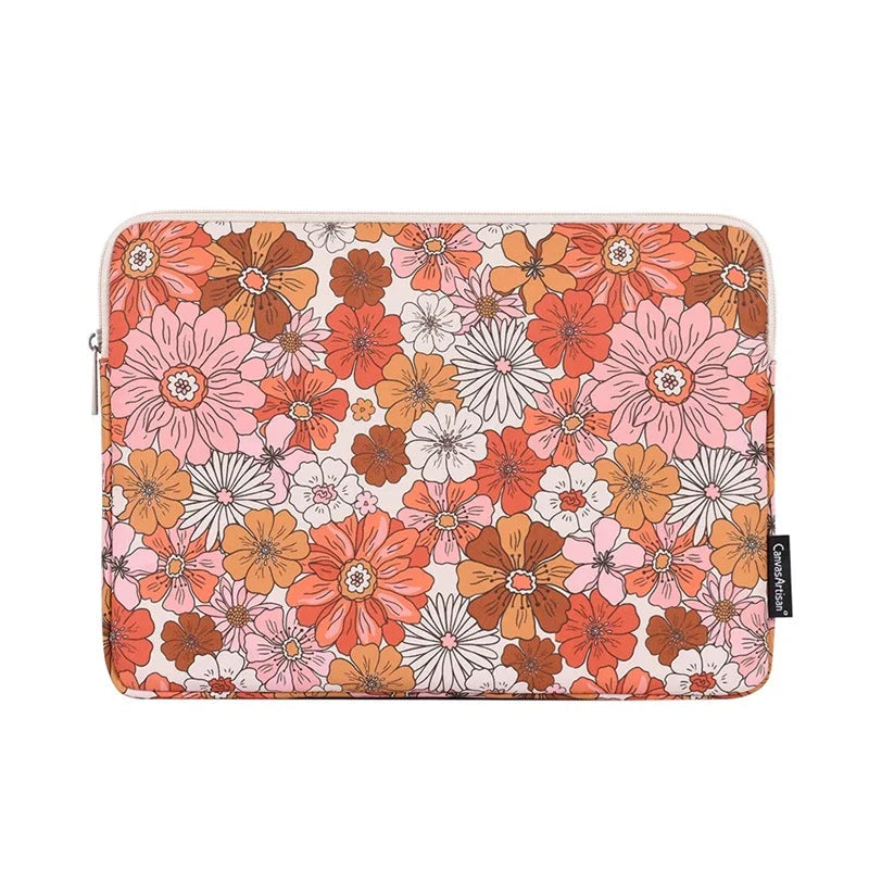 Floral 70s vibe laptop sleeve with retro pink and orange flower print
