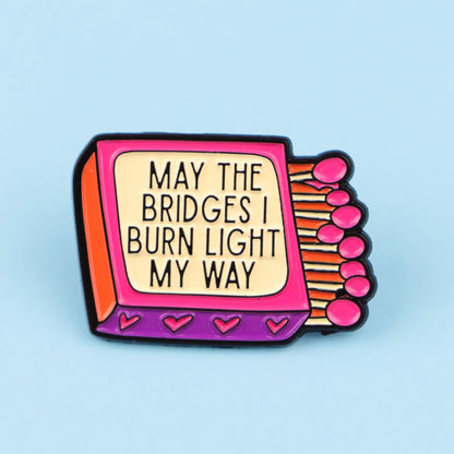 “May the Bridges I Burn Light My Way” Enamel Pin