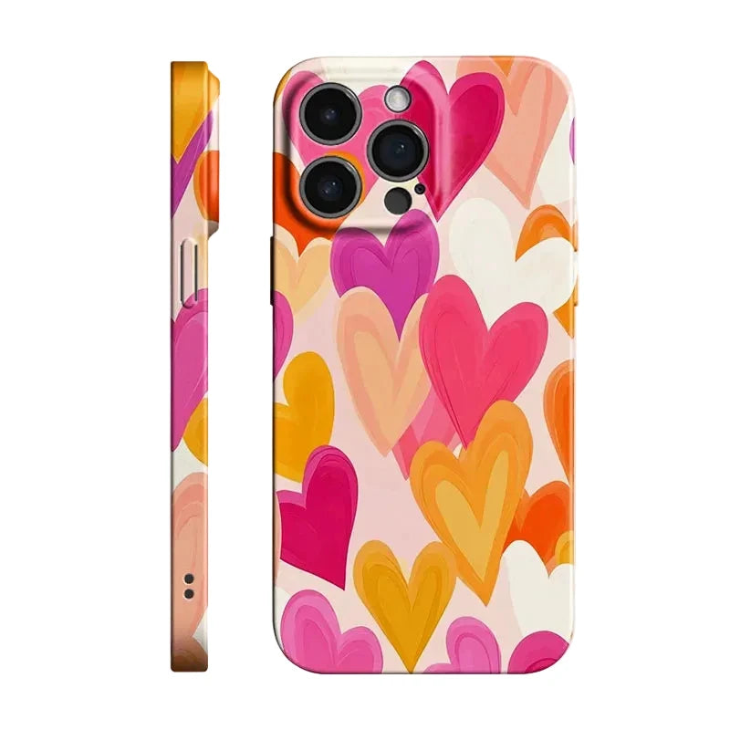 A phone case with a colorful pattern of overlapping hearts in pink, orange, yellow, and purple on a white background, shown from both the back and side views.