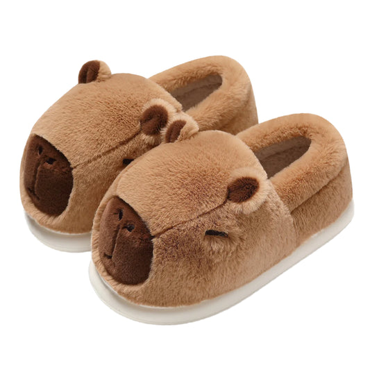 Pair of capybara plush slippers showing the cute face and fluffy upper